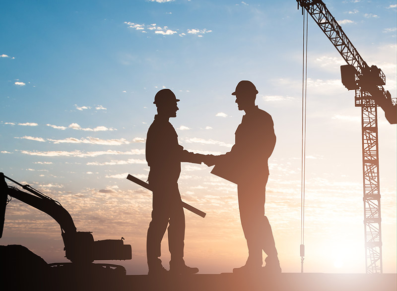 Architects Shaking Hands Outdoors